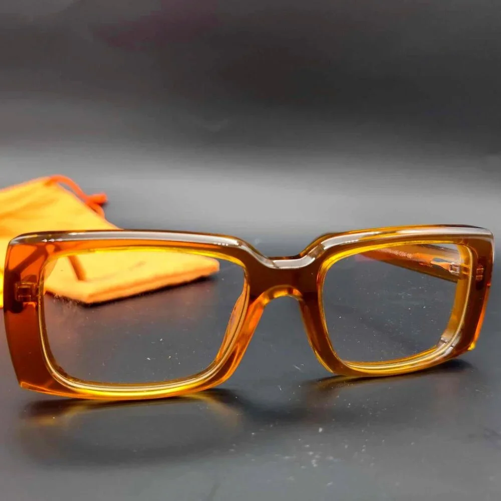 Brown glasses/frames, clear lenses (non-prescription) Vooglam – Eirwyn style